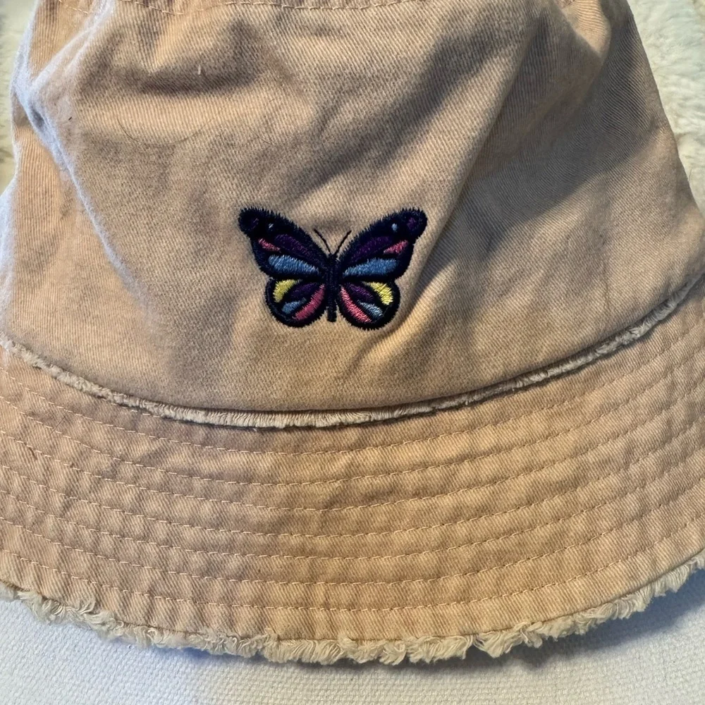 David and Young Khaki colored Bucket Hat. Has a Butterfly on the front New